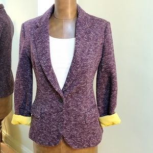 Cartonnier, purple blazer, yellow cuff